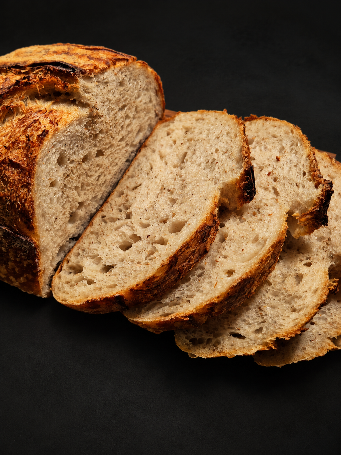 Sliced white sourdough loaf showing the crumb – The Original Gentleman