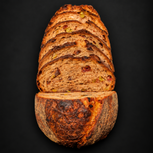 Sliced sun-dried tomato, olive and herb sourdough loaf – The Tuscan Regent